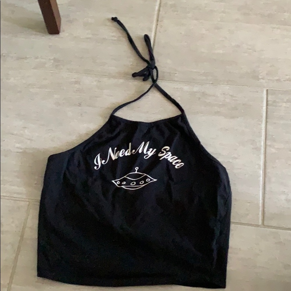 Black tank top. With print.